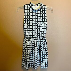 Necessary objects black and white dress